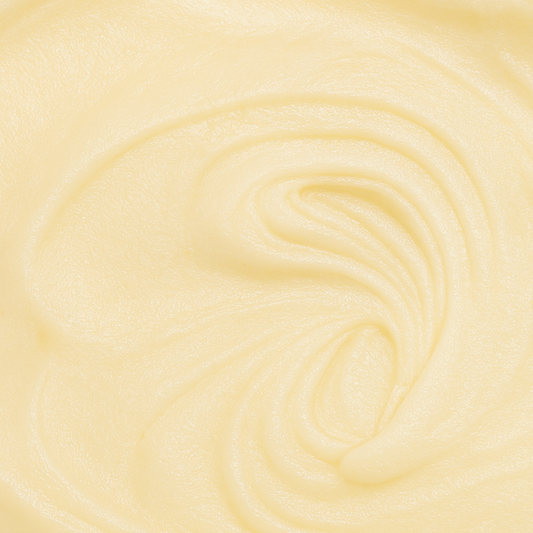 Close-up of element organics golden tallow balm's texture. Smooth & creamy.
