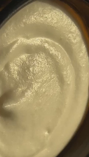 Video close up displaying the texture  of element organics tallow face cream and golden tallow balm.
